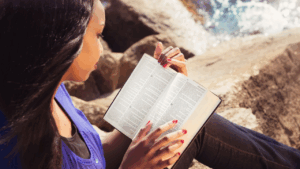 Woman reading Bible in quiet time – seeking discernment