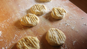 the mandazi/fritter pieces with decorative ridges made using a fork