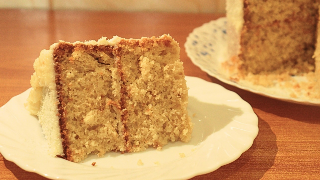 a piece of the decorated no oven stovetop coconut cake