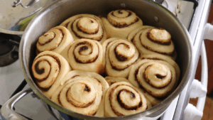 Cinnamon rolls are ready and firm on the surface.