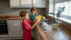children working together in doing chores