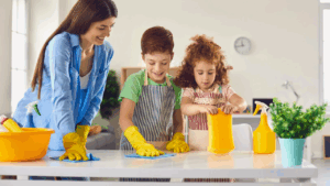 Christian mom teaching children chores at home