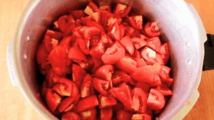 the ripe tomatoes cut into quarters and eighths.