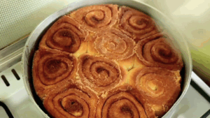 cardamom rolls flipped upside down in the pan to brown the surface