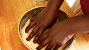 forming the focaccia bread dimples with my fingers.