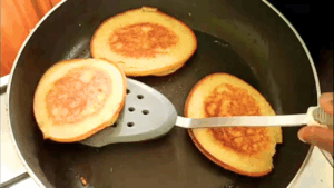 transfer done cornbread pancakes to a plate or tray lined with paper towels