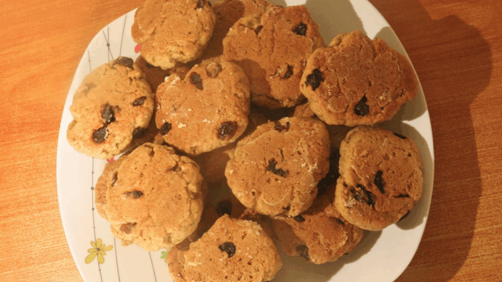 No-oven stovetop banana cookies served on a plate, soft and chewy with raisins.