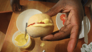 the budget-friendly homemade mayo being used as a condiment spread on rolls
