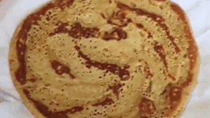 place the done pancake on a plate or platter lined with paper towels to absorb any excess oil