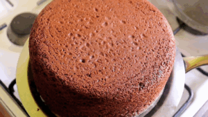 Soft, moist no oven chocolate cake flipped out of the pan