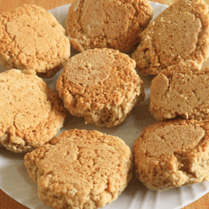 Golden, no oven crunchy tea scones served on a plate and ready for tea-time.
